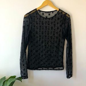 Black lace long sleeve top, with star detailing